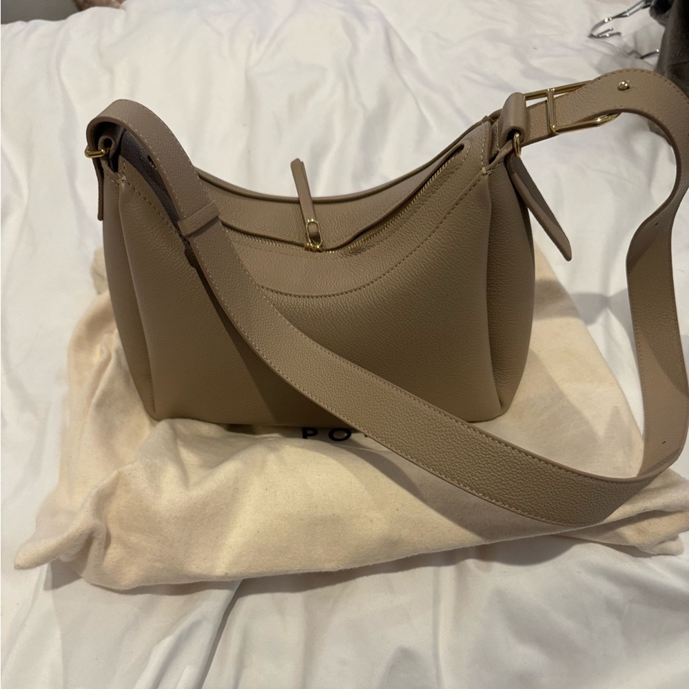 New, never used Polene Umi bag in clay.  Dust bag included.